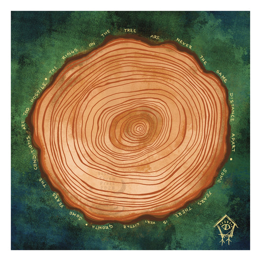 a cross-section of a tree on a mossy green background, ringed with a poem about personal growth